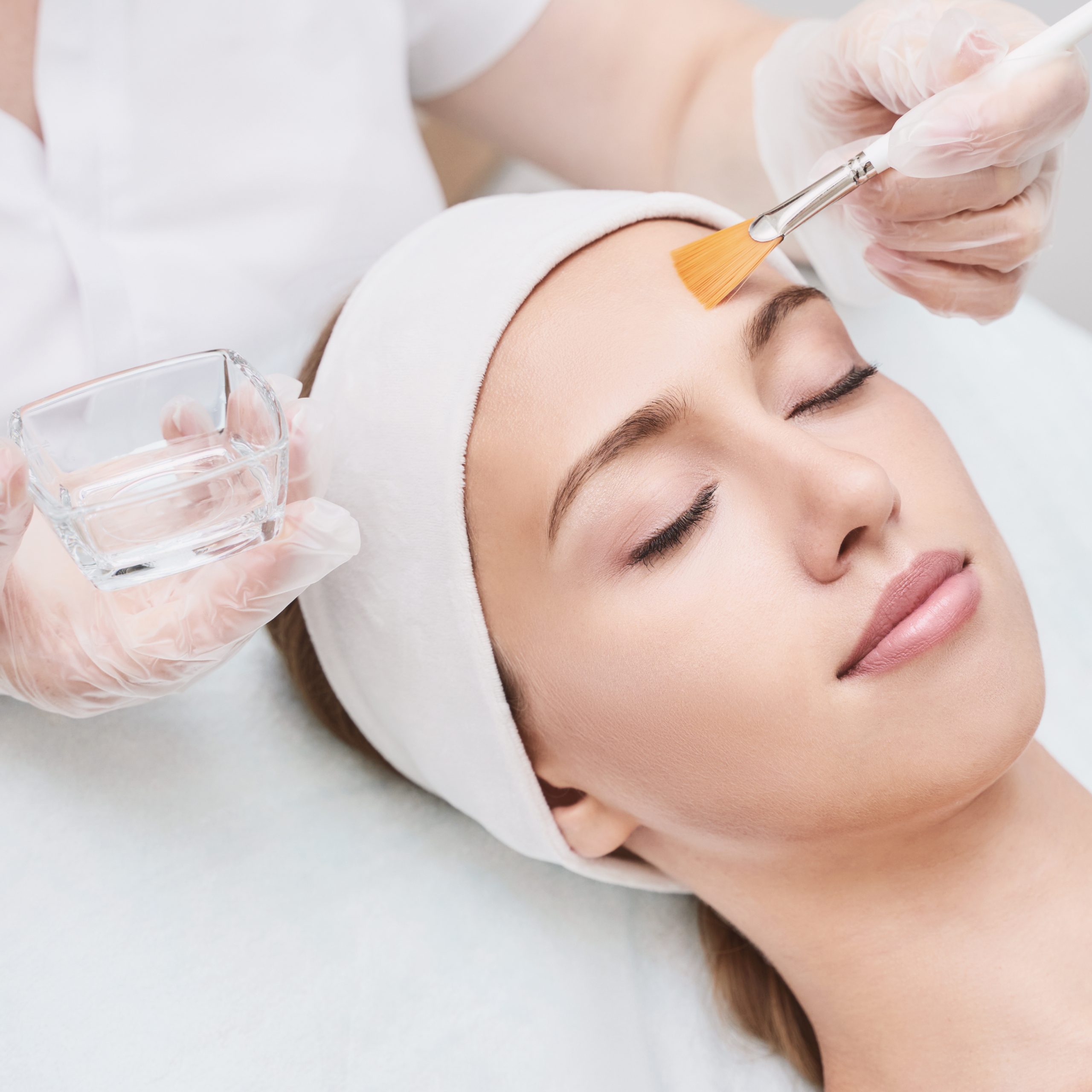 Bliss Skin Care Neutral Bay Sydney. A woman relaxes while receiving a glycolic acid peel treatment.